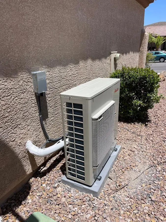 Residential air conditioning condenser unit in Brent